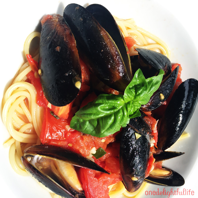 Rinse these pre-cooked, frozen mussels in a colander before adding them to the pomodoro sauce.