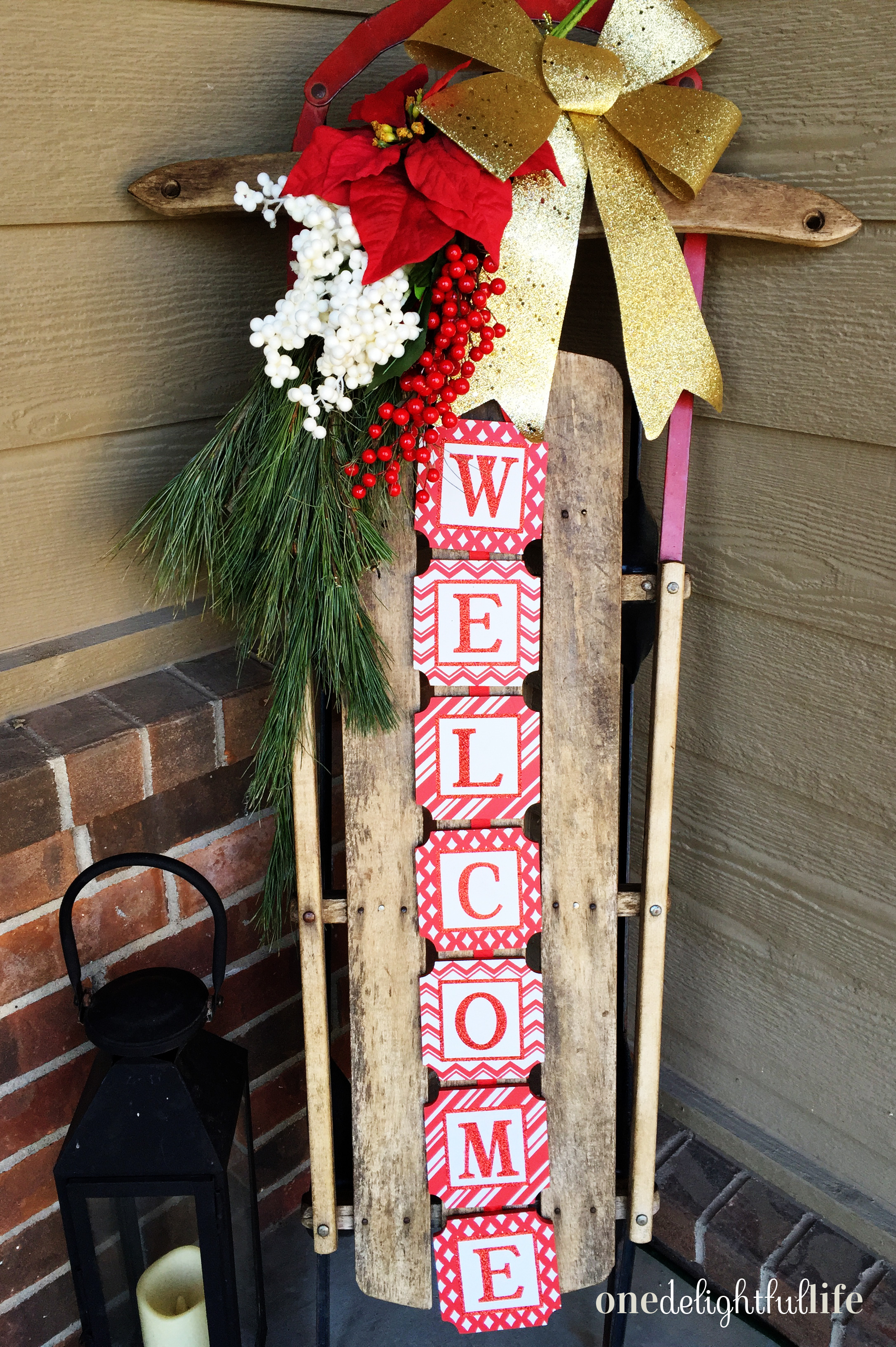Don't forget to decorate the front porch too! This antique sled is a trending decor item for the winter season. This one was purchased 40% off during Shop Small Saturday this year.
