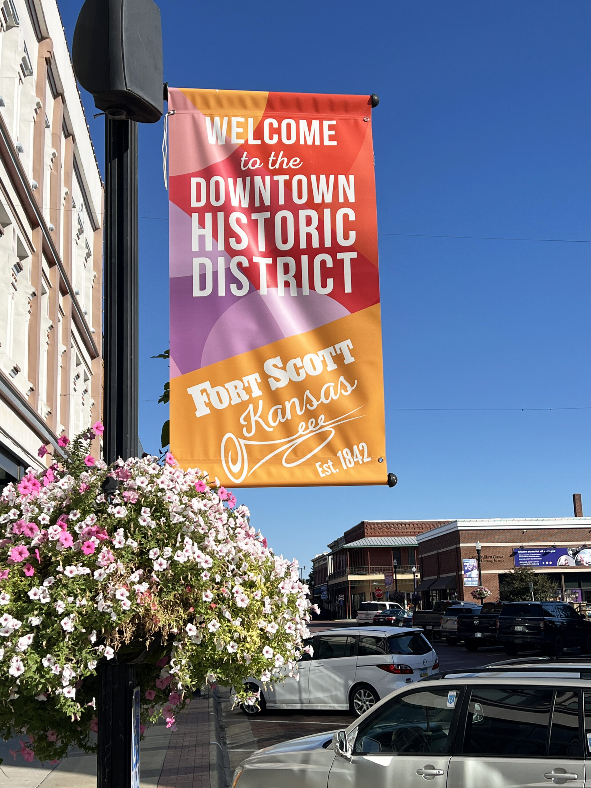 Banners hang from light posts in downtown Fort Scott, welcoming visitors to the historic district.