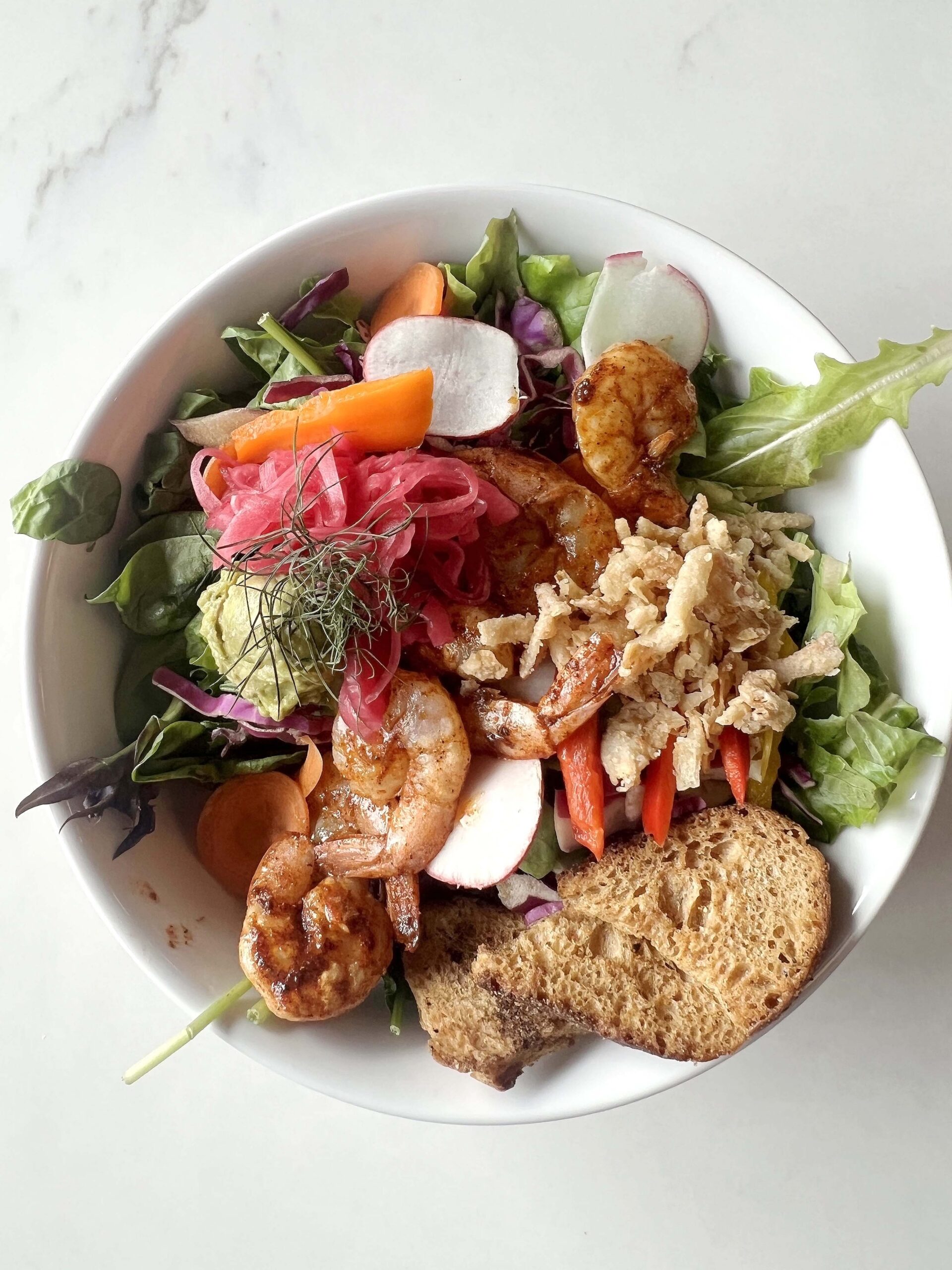 Salad served at TOAST in Pittsburg, Kansas, includes regionally sourced ingredients. 