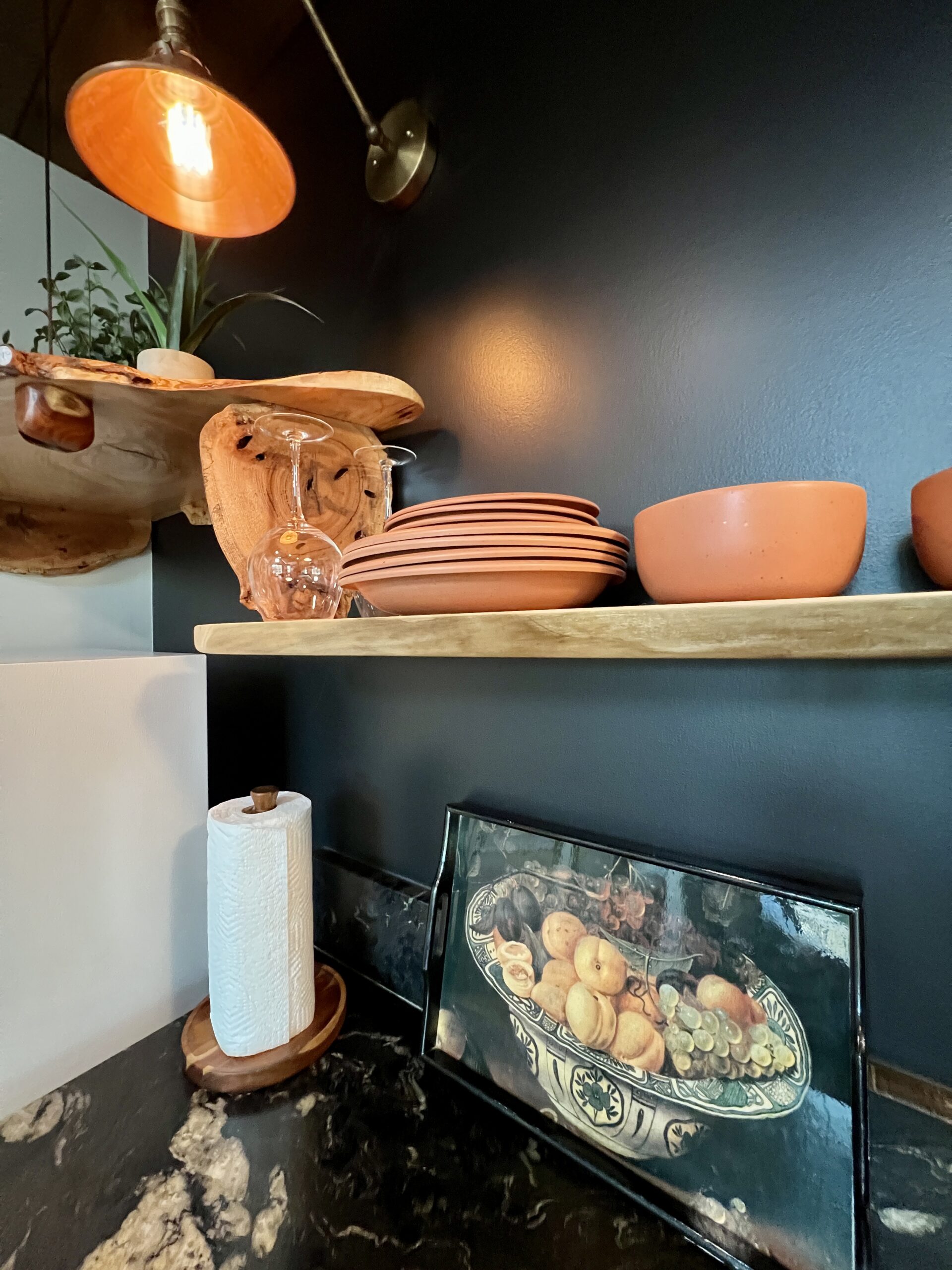 Other perks include a flat-screen TV that doubles as a digital art gallery, a fully stocked coffee station, and a refrigerator with bottled drinks.