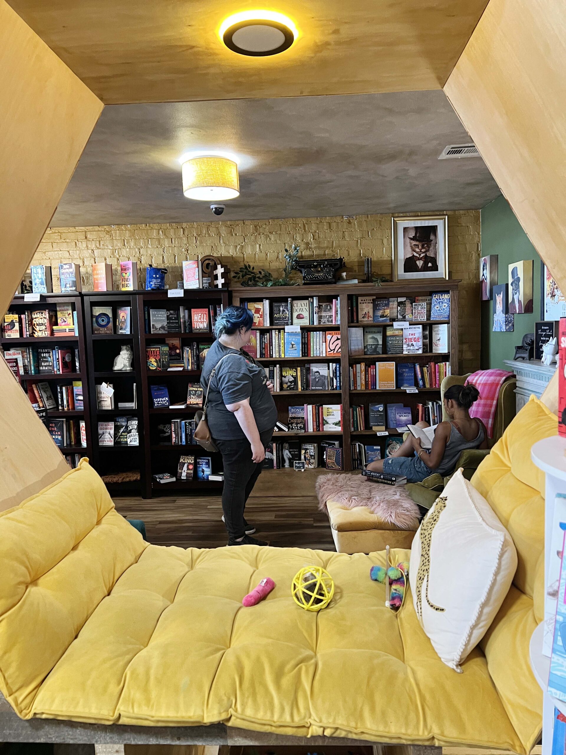 A reading nook at the Literary Cat Company in PIttsburg, Kansas, gives readers a chance to preview books.