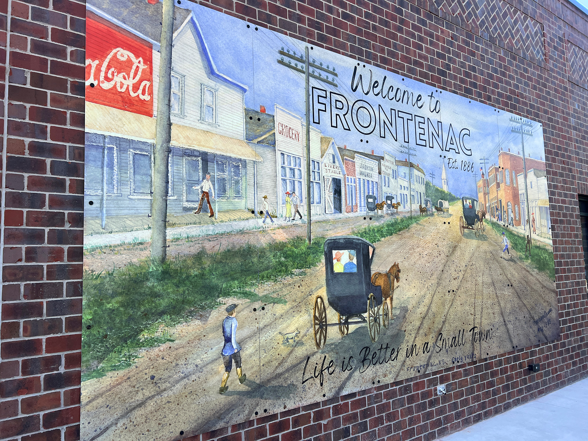 Mural in Frontenac, Kansas, highlights the town's history and evolution. 