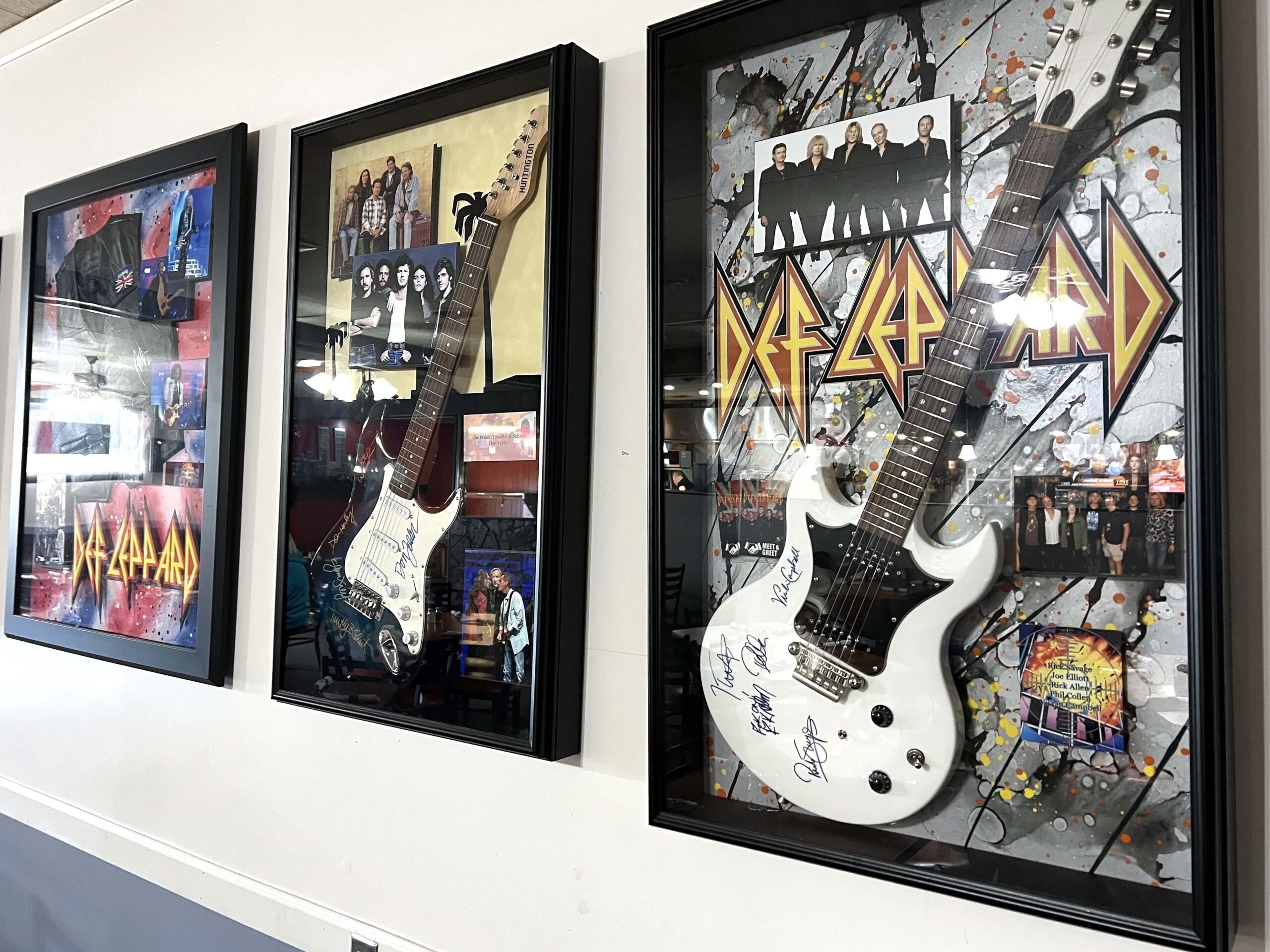 Concert, sports memorabilia, and signed guitars adorn the walls in restaurants, paying homage to the owners' love of music. 