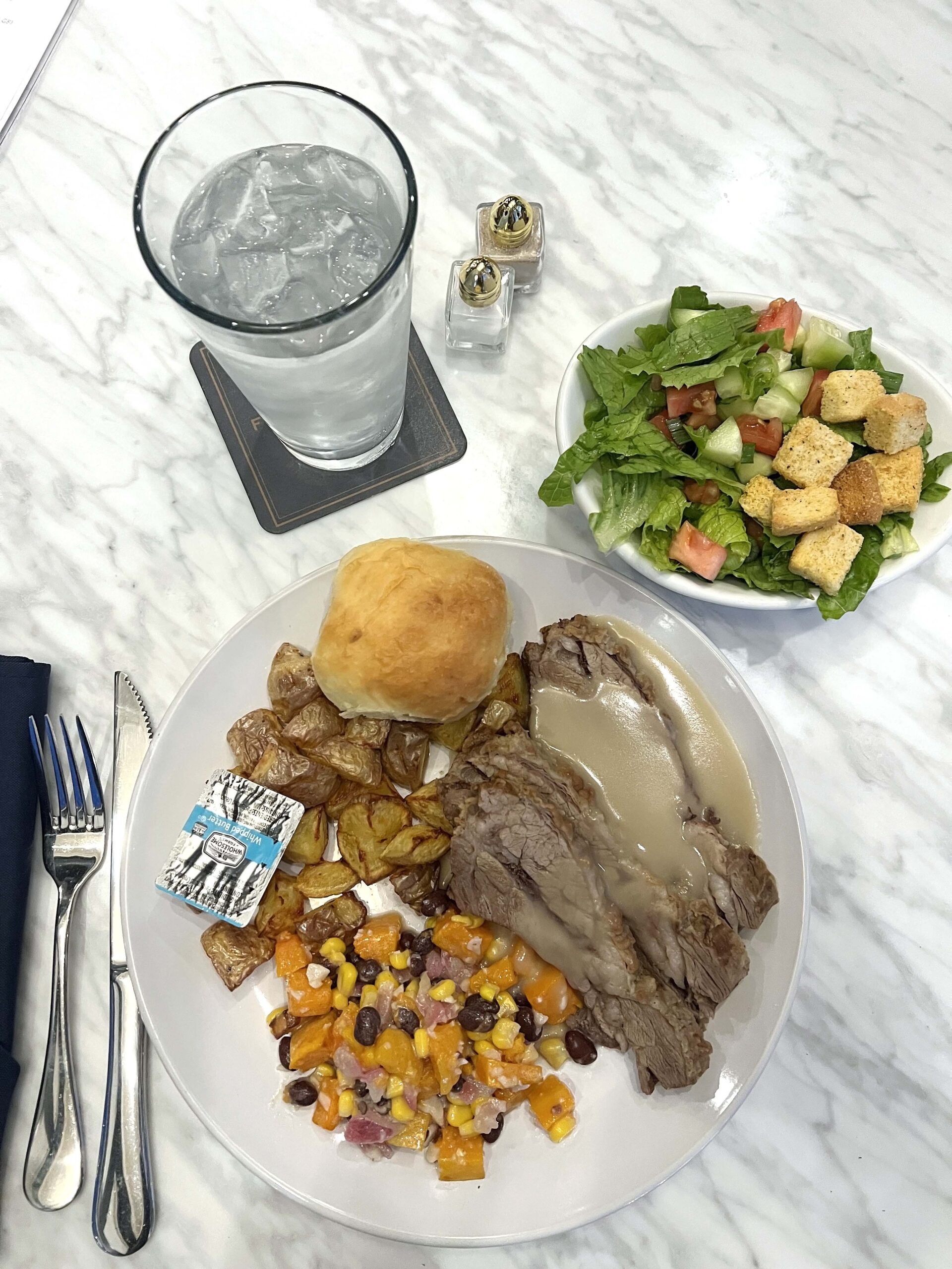 Braised beef with a squash-corn salad was my dinner menu selection at Forrester's at Hotel Garber. 