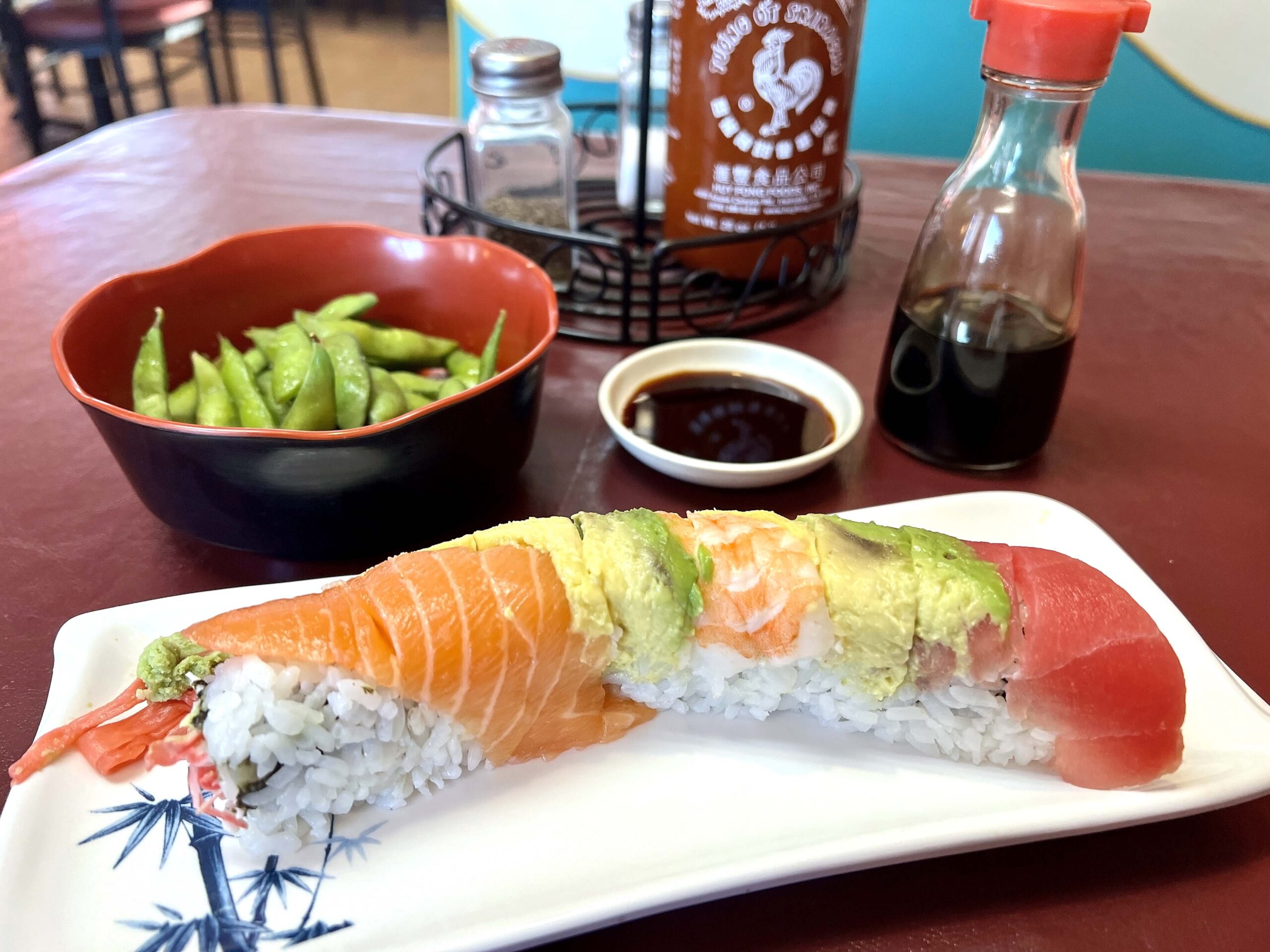 Rainbow Roll is served at Tomi Sushi & Steak. 