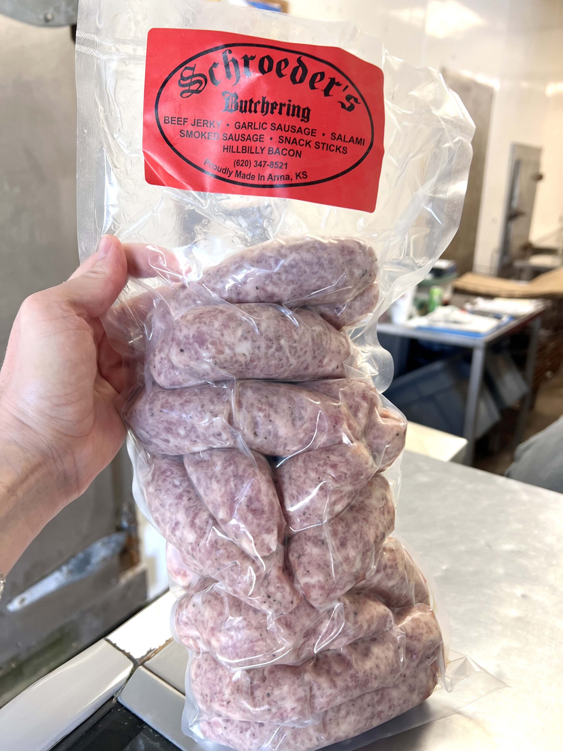 Schroeder's sausage links are packaged daily for sale.