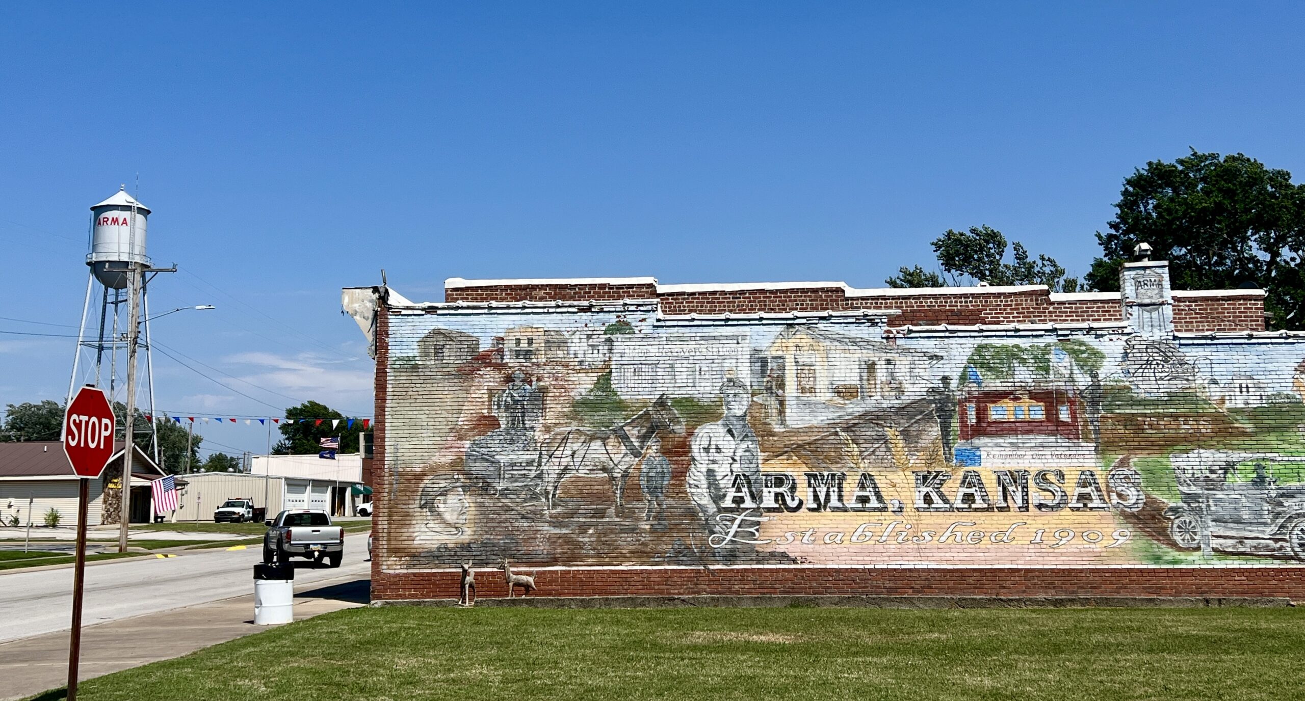 The imagery in the Arma Centennial Mural represents the town's mining and military history. 