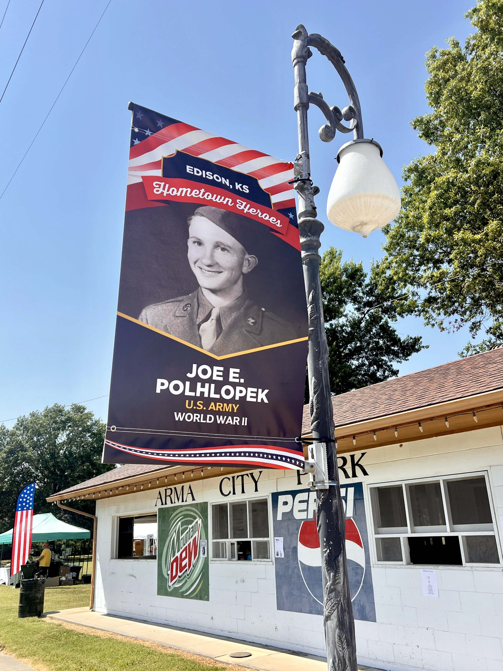 Local veterans are honored with lightpole banners along Washington Street.