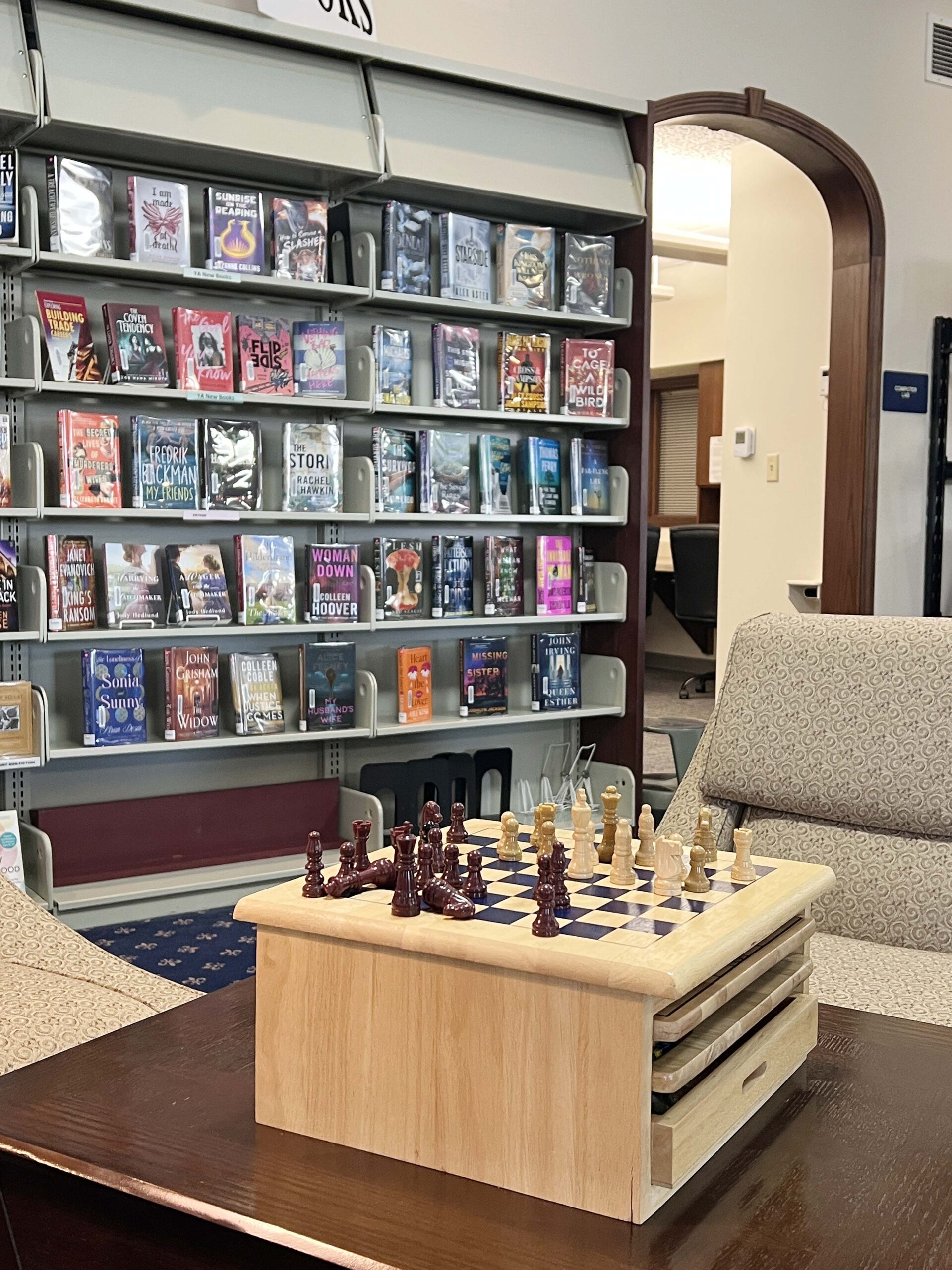 Coffey County Library - Burlington Branch book shelves with chess set