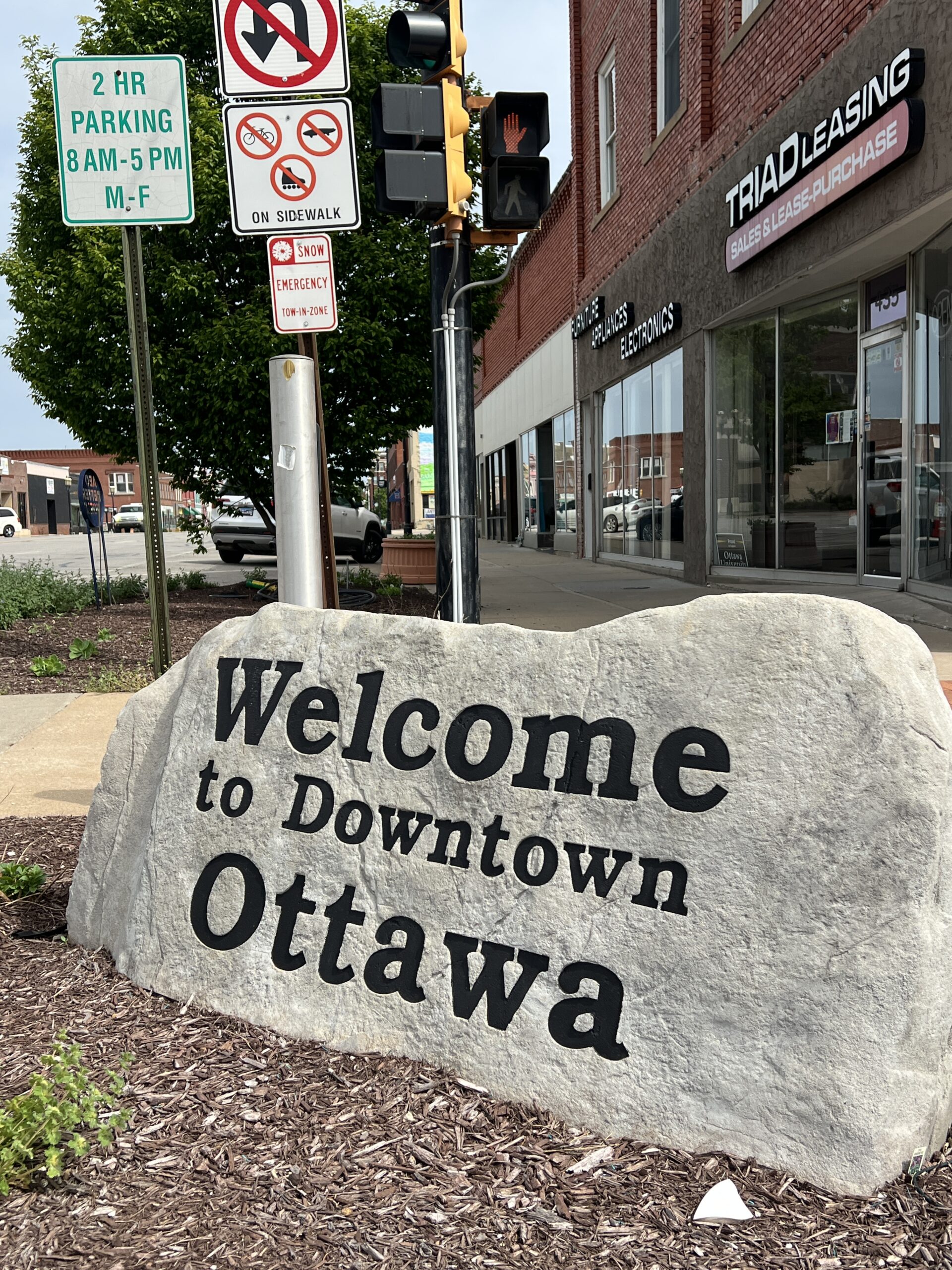 welcome to ottawa kansas sign on main street