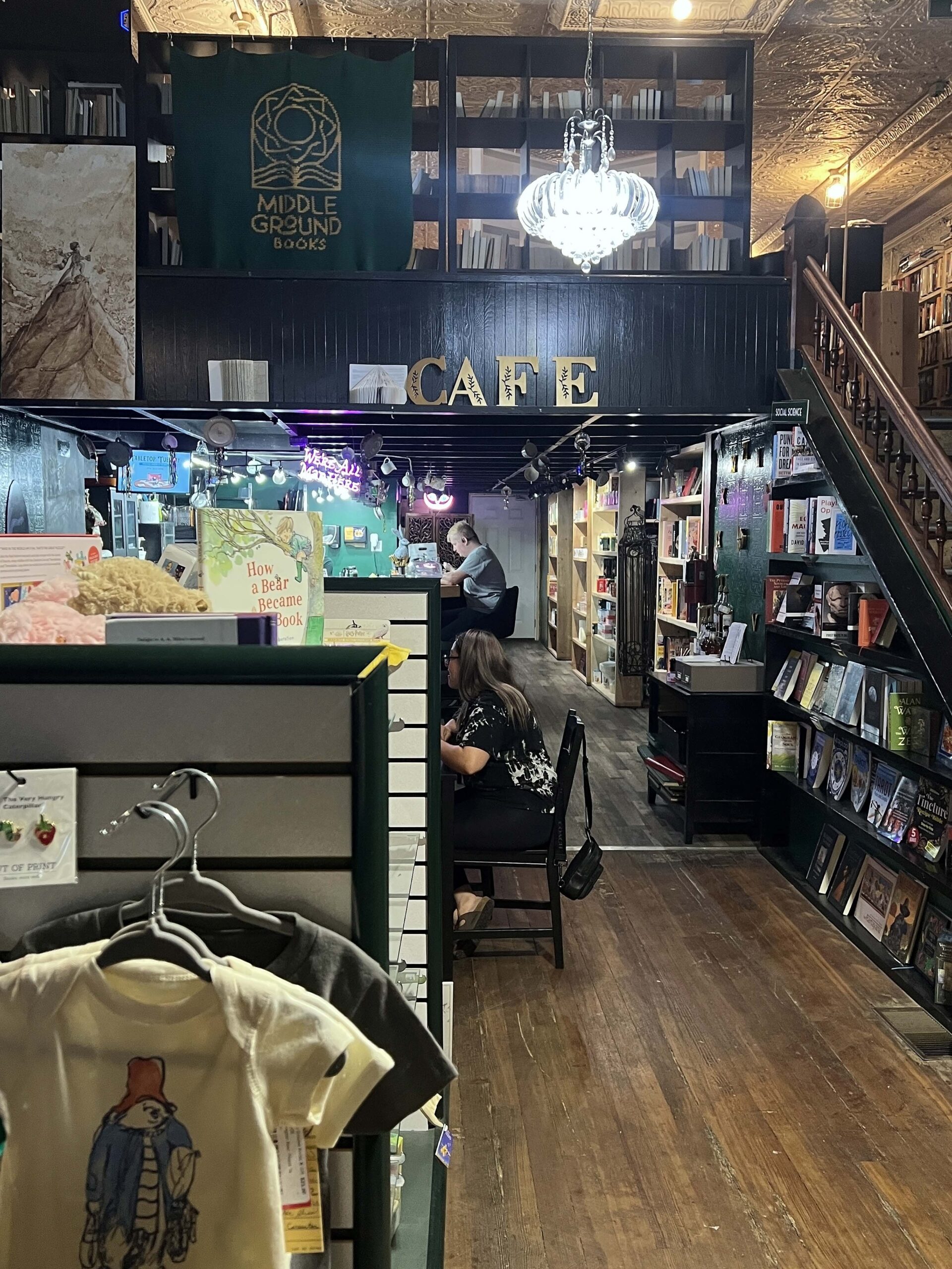 Middle Ground Books in downtown Emporia is a two-story, dimly list shop with a coffee counter in the back of the store.