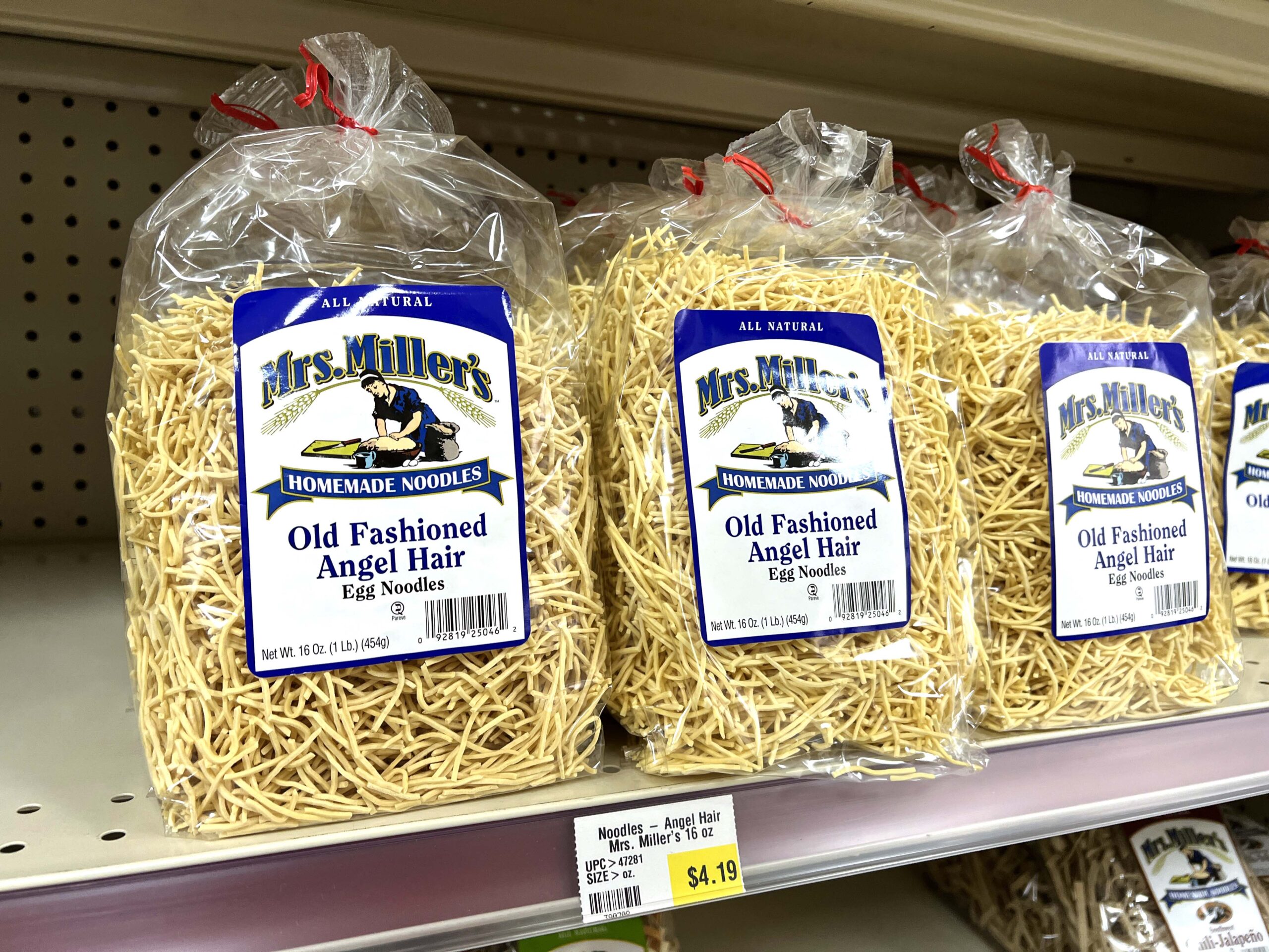 Noodles, spices, and baking supplies line the shelves at Wray Bulk Foods. 