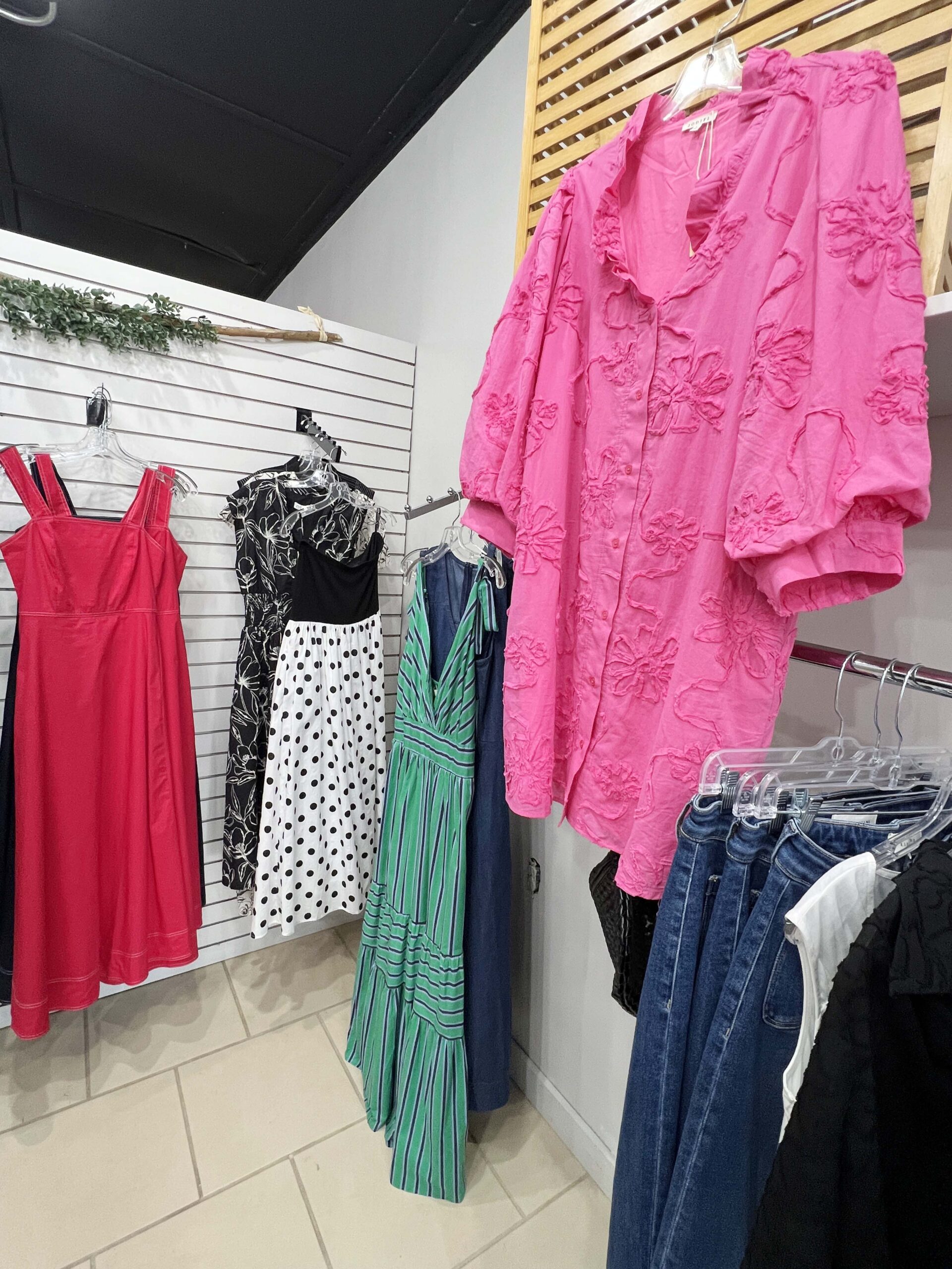 Dresses and blouses dominate the inventory at The Pink Suitcase in Ottawa.