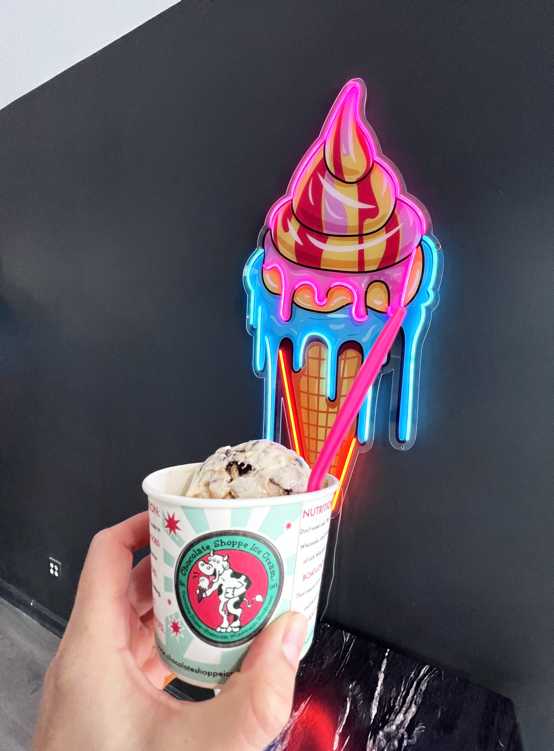 Two scoops of ice cream served in a cup at Ice Cream House in Ottawa, Kansas, one of two of their locations. 
