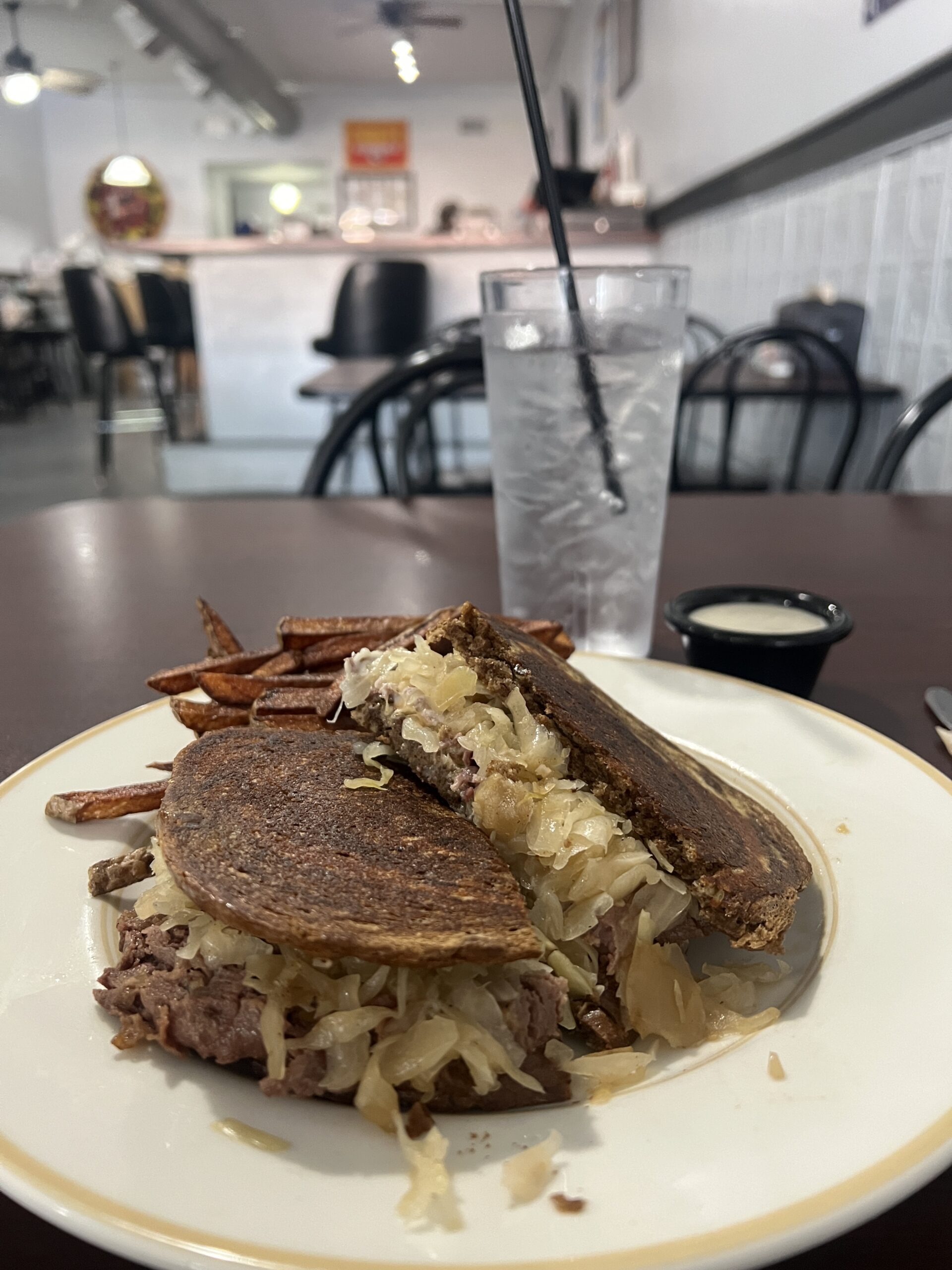 Reuben Sandwich is served with your choice of fries. 