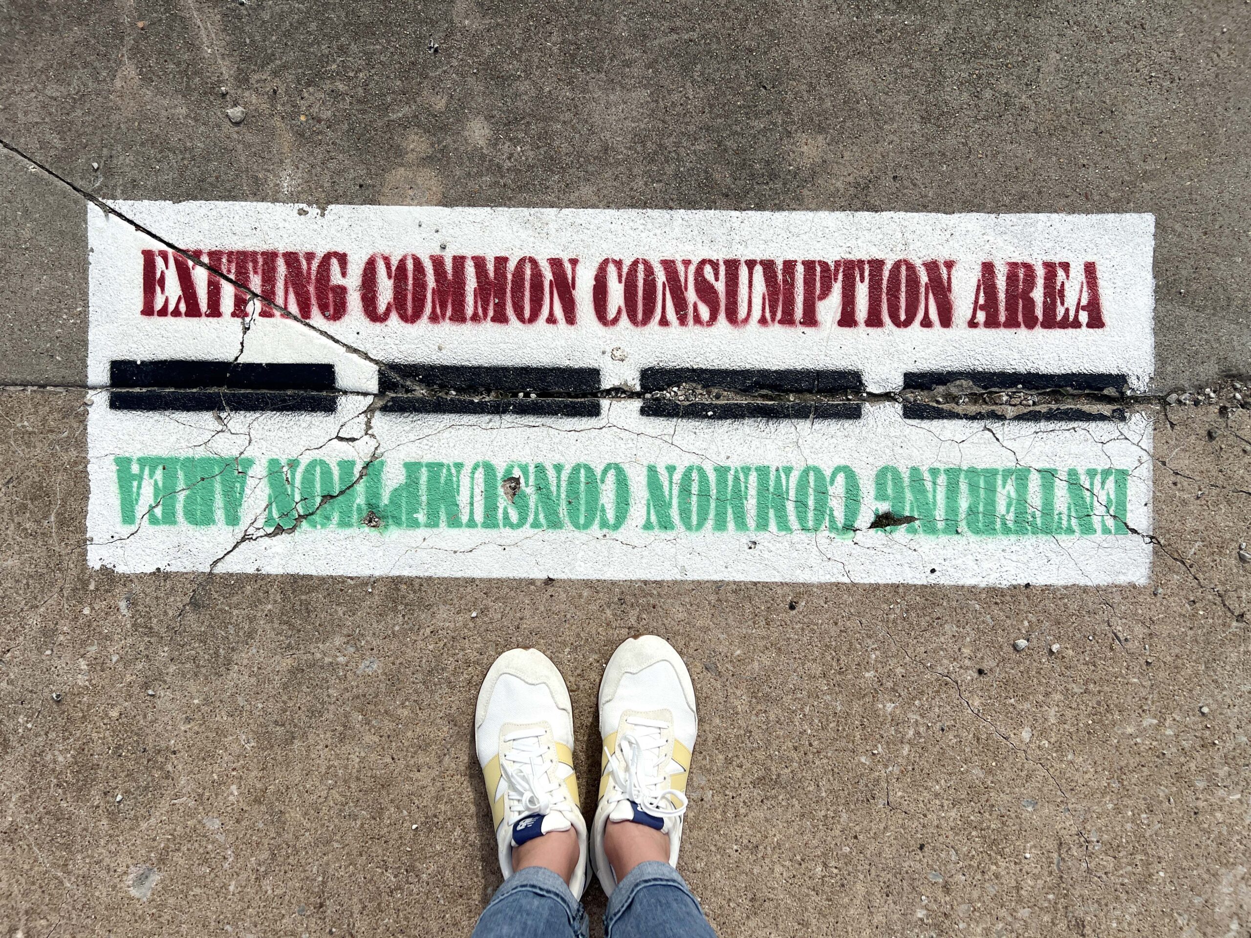 Common Consumption Areas are well marked in downtown Ottawa, Kansas, indicating where patrons can walk with open drinks. 