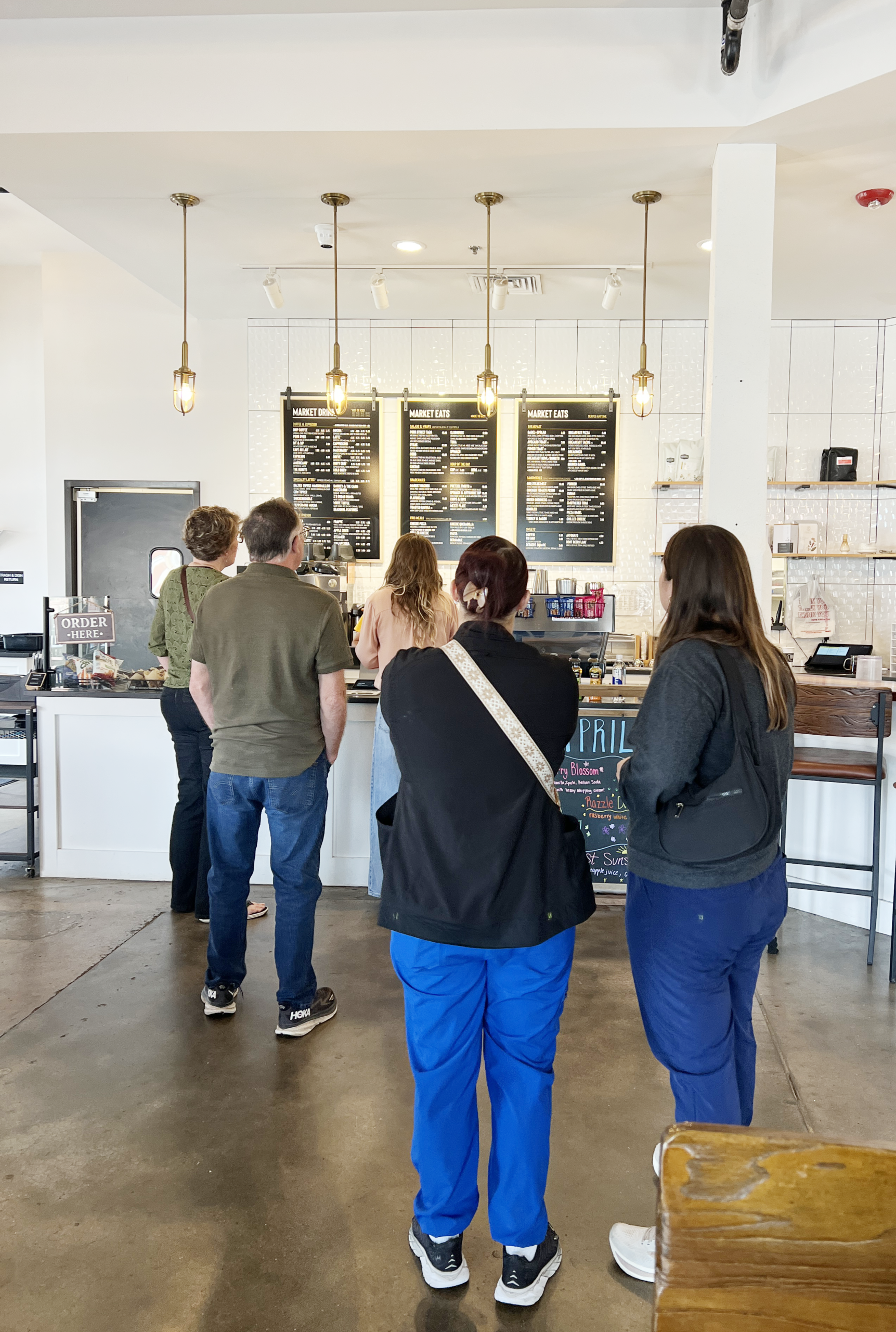 Customers line up to order at Corner Market, one of the newest restaurants on Main Street in Ottawa, Kansas.