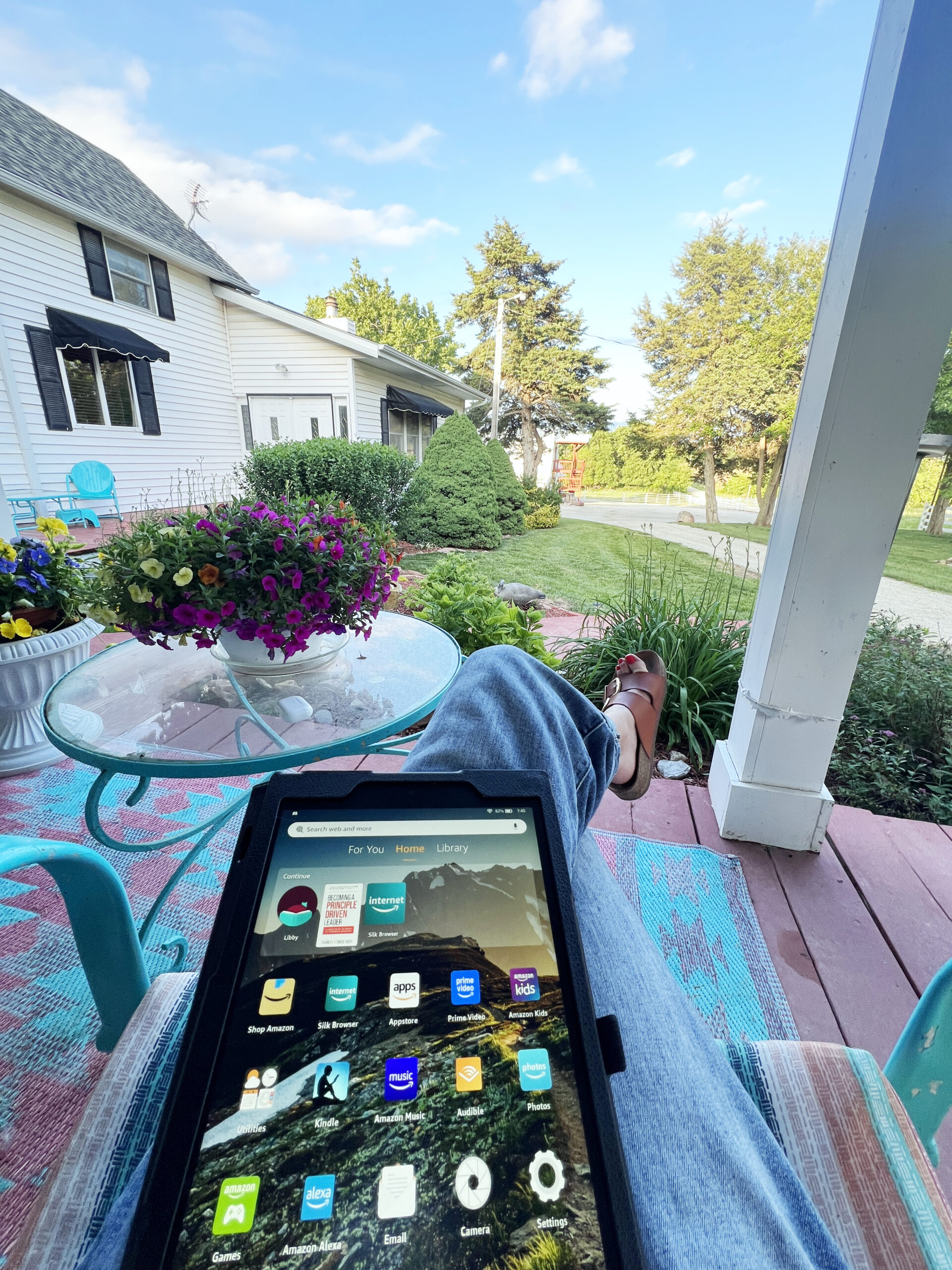 Reading an electronic book on the front porch. 