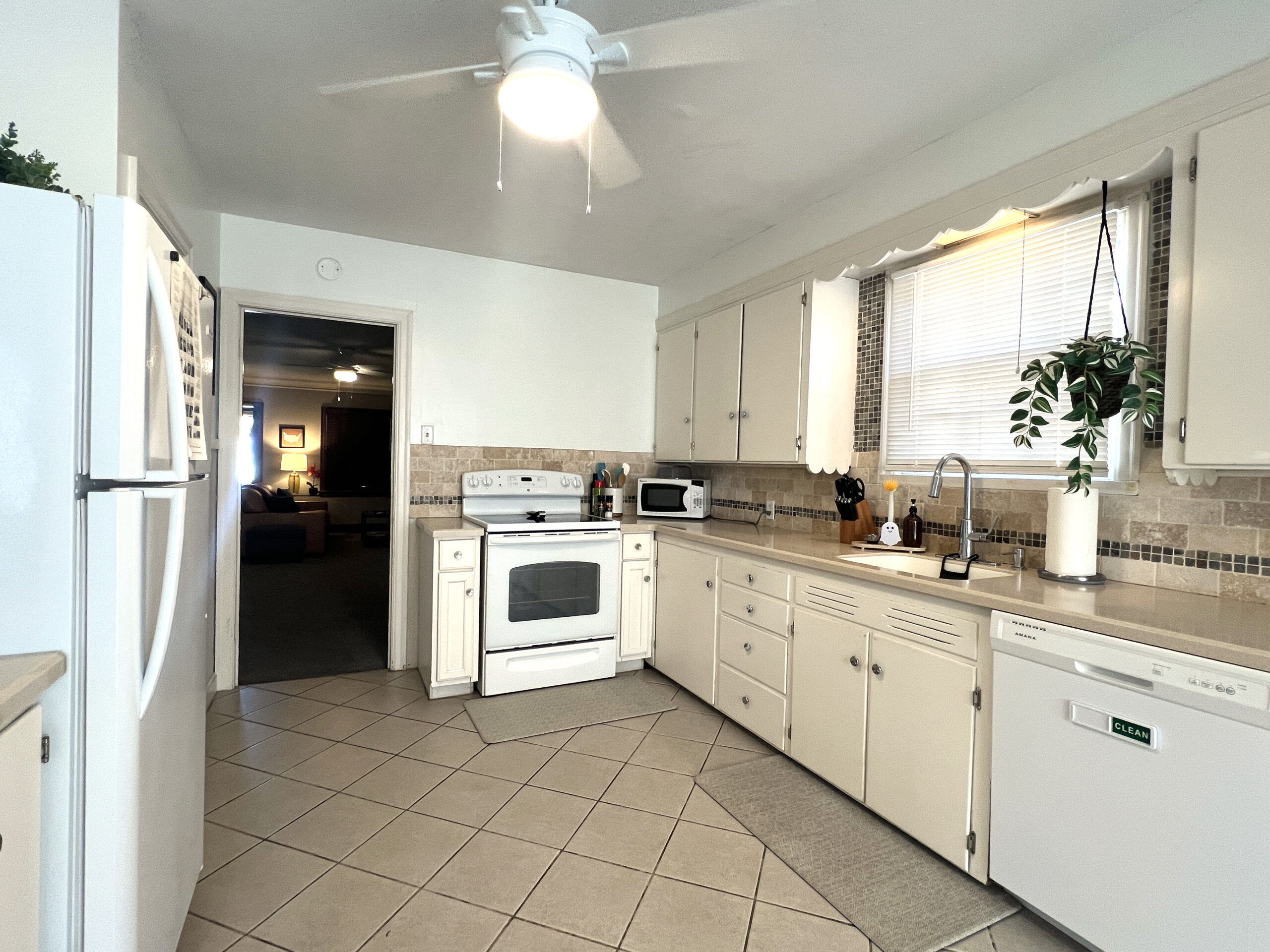A full kitchen comes with supplies and a coffeemaker.
